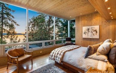 Dormitorio en una casa de madera - diseño y foto