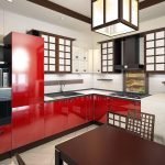 Muebles rojos en el interior de una cocina blanca