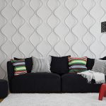 Paneles 3d en la pared detrás del sofá
