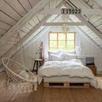 Dormitorio abuhardillado en blanco