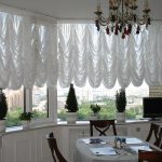 Cortinas francesas en un ventanal