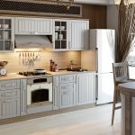 Muebles grises combinados con un área de madera natural.