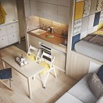 Cocina, comedor y sala de estar en una habitación.