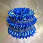 Ataúd azul con cuentas