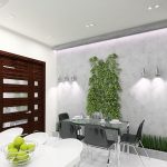 Interesante decoración de pared frente a la mesa