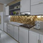 Muebles blancos y azulejos dorados.