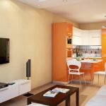 Muebles de cocina naranja en el interior.