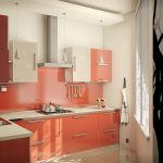 Muebles de color rosa y beige en la cocina.