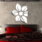 Flor de los espejos sobre la cama