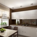 Paredes oscuras y muebles claros en la cocina.