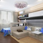 Habitación con sala de estar y dormitorio.