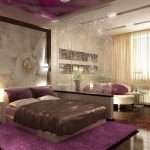 Habitación con dormitorio y sala de estar.