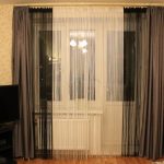 Cortinas de filamento blanco y negro en la sala de estar