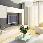 La combinación de paredes grises y muebles blancos en la sala de estar