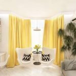 Habitación blanca con cortinas amarillas.