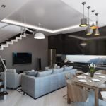 Cocina-sala de estar en una casa de dos pisos