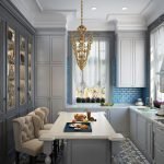 La combinación de paredes azules y muebles blancos.