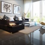 Sofá esquinero negro y sillón
