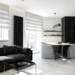 Piso blanco y muebles oscuros en el apartamento.