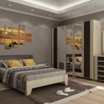 Cuadro modular sobre la cama