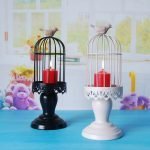 Velas en posavasos con jaulas