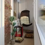 Silla colgante en el balcón