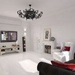 Sofá gris en una sala blanca