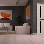 Muebles blancos en una sala gris