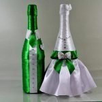 Traje verde y vestido blanco