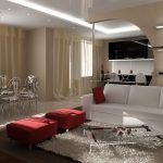 Otomanas rojas y sofá blanco en la sala de estar