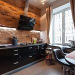 Cocina tipo loft en el departamento