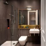 Bañera con baranda de vidrio