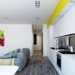 Amplia cocina combinada con un hall de entrada.