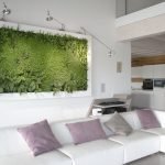 Sala de estar con sofá de esquina blanco