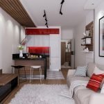 Cocina blanca con delantal rojo