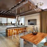 Laminado en el piso y paredes de la cocina-comedor.