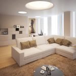 Interior con sala, comedor y cocina.