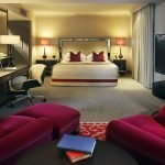 Dormitorio con sala de estar