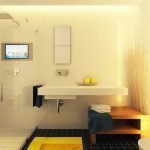 Acentos amarillos en un baño pequeño.
