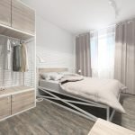 Papel pintado debajo del ladrillo en el dormitorio