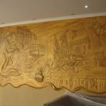 Bajorrelieve en tonos dorados
