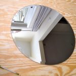 Rodea el espejo en madera contrachapada