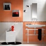 Azulejo naranja en el baño.