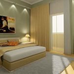 Interior de dormitorio en colores verde y beige.