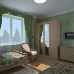 Interior de dormitorio simple en colores verde y beige.