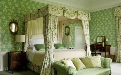 Dormitorio de diseño en colores verdes.