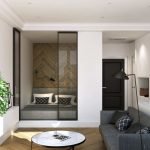 Cama detrás de una pantalla de cristal