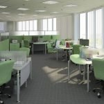 Interior de oficina en colores verde claro y blanco.