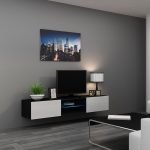 Muebles blancos en un interior gris.