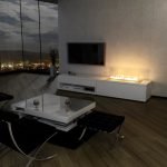 Sillas negras alrededor de una mesa blanca